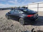 ✅ 2017 Ford Fusion Hybrid Titanium • VIN: 3FA6P0RU8HR113952 • Lot: 89856085. Wystawiony na Copart z przebiegiem Nie podano. Bezpłatny archiwum sprzedaży aukcyjnych z USA i szczegółowy raport historii pojazdu na DreamBid. Zdjęcie 2.