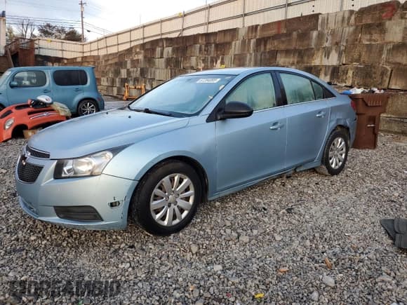 ✅ 2011 Chevrolet Cruze LS • VIN: 1G1PC5SH5B7101592 • Lot: 87284085. Listed on Copart with 166,444 mi. Free auction sales archive from the USA and detailed vehicle history report at DreamBid. Image 1.