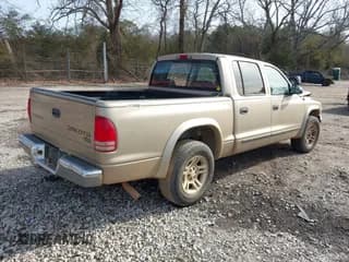 ✅ 2003 Dodge Dakota SLT • VIN: 1D7HL48X53S348636 • Lot: 41329221. Wystawiony na IAAI z przebiegiem 133 075 mil. Bezpłatny archiwum sprzedaży aukcyjnych z USA i szczegółowy raport historii pojazdu na DreamBid. Zdjęcie 4.