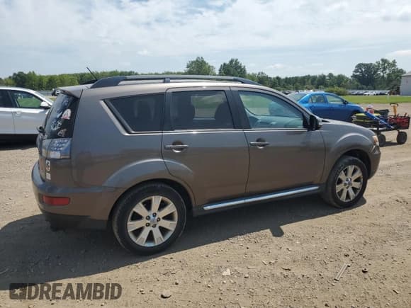 ✅ 2012 Mitsubishi Outlander SE • VIN: JA4AS3AWXCU003952 • Lot: 68189355. Wystawiony na Copart z przebiegiem 208 104 mil. Bezpłatny archiwum sprzedaży aukcyjnych z USA i szczegółowy raport historii pojazdu na DreamBid. Zdjęcie 3.