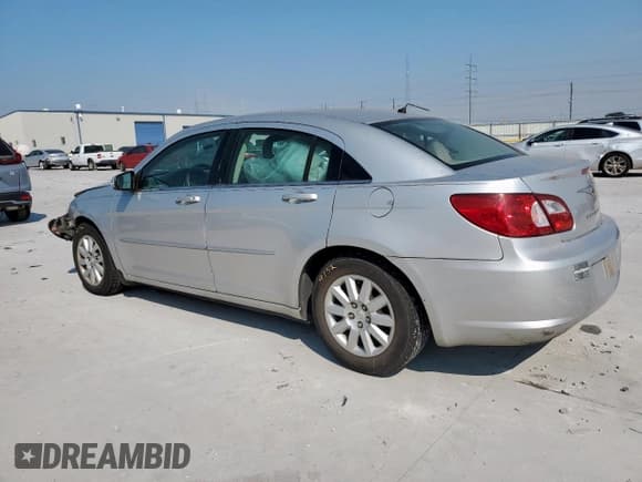 ✅ 2007 Chrysler Sebring • VIN: 1C3LC46K17N550846 • Lot: 81664645. Listed on Copart with 129,380 mi. Free auction sales archive from the USA and detailed vehicle history report at DreamBid. Image 2.