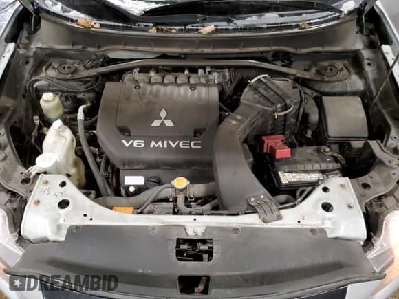 ✅ 2010 Mitsubishi Outlander LS • VIN: JA4JT3AX4AZ601735 • Lot: 83313844. Wystawiony na Copart z przebiegiem 96 444 mil. Bezpłatny archiwum sprzedaży aukcyjnych z USA i szczegółowy raport historii pojazdu na DreamBid. Zdjęcie 13.