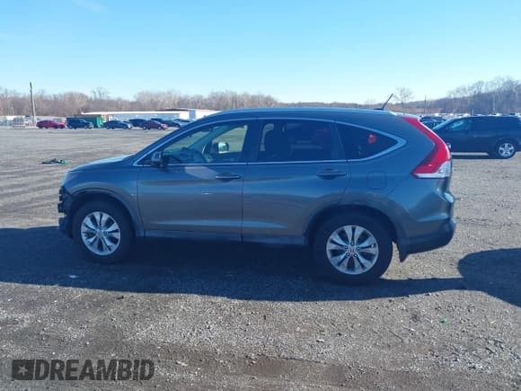 ✅ 2012 Honda CR-V EX-L • VIN: JHLRM4H77CC021180 • Lot: 43807202. Listed on IAAI with 149,599 mi. Free auction sales archive from the USA and detailed vehicle history report at DreamBid. Image 14.