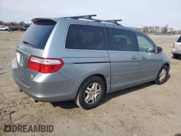 ✅ 2007 Honda Odyssey EX-L • VIN: 5FNRL38797B011513 • Lot: 92070585. Listed on Copart with 202,191 mi. Free auction sales archive from the USA and detailed vehicle history report at DreamBid. Image 3.