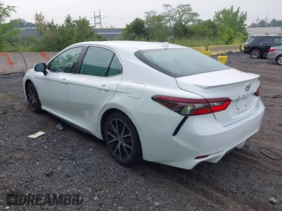 2021 Toyota Camry SE with VIN 4T1T11BK4MU025539, listed as a IAAI auction lot 42898008 with 26,083 mi miles and . Bid and sale history available at DreamBid. Image 3.