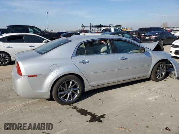 ✅ 2012 Chevrolet Malibu 2LT • VIN: 1G1ZD5E04CF140399 • Lot: 83236864. Listed on Copart with 123,410 mi. Free auction sales archive from the USA and detailed vehicle history report at DreamBid. Image 3.