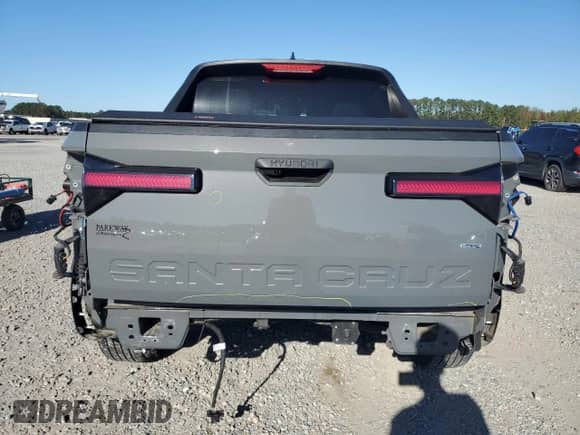 2023 Hyundai Santa Cruz SEL z VIN 5NTJBDAE4PH060653, wystawiony jako Copart lot #82682805 z przebiegiem 33 020 mil mil oraz Szkoda całkowita • Salvage title. Historia ofert i sprzedaży dostępna na DreamBid. Obrazek 6.