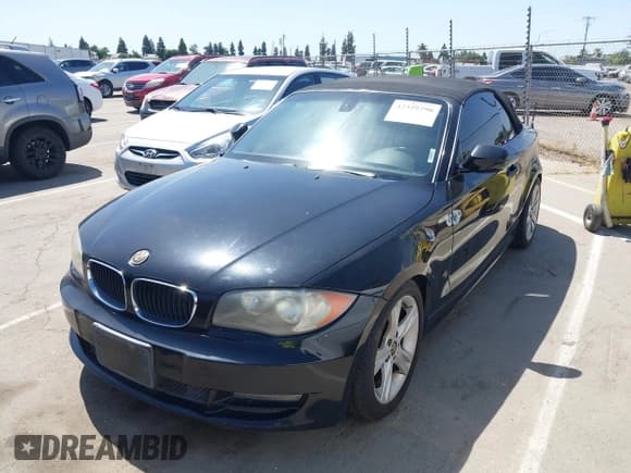 ✅ 2010 BMW 1 Series 128i • VIN: WBAUN1C52AVH81995 • Lot: 42359298. Listed on IAAI with 137,443 mi. Free auction sales archive from the USA and detailed vehicle history report at DreamBid. Image 2.