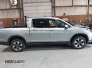 ✅ 2017 Honda Ridgeline RTL-E • VIN: 5FPYK3F7XHB022885 • Lot: 42844394. Listed on IAAI with 85,920 mi. Free auction sales archive from the USA and detailed vehicle history report at DreamBid. Image 13.