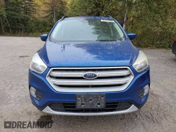 2018 Ford Escape SE z VIN 1FMCU9GD7JUA05961, wystawiony jako Copart lot #82458805 z przebiegiem Nie podano mil oraz Czysty tytuł • Clean title. Historia ofert i sprzedaży dostępna na DreamBid. Obrazek 5.