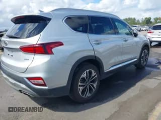 ✅ 2019 Hyundai Santa Fe Limited • VIN: 5NMS53AA3KH015002 • Лот: 43390736. Опубликован ранее на IAAI с пробегом 103 123 миль. Бесплатный доступ к архиву аукционных продаж из США и подробный отчёт об истории автомобиля на DreamBid. Изображение 4.
