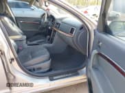 ✅ 2010 Lincoln MKZ • VIN: 3LNHL2GC4AR608669 • Lot: 42198042. Listed on IAAI with 122,715 mi. Free auction sales archive from the USA and detailed vehicle history report at DreamBid. Image 5.