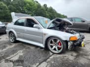 ✅ 1998 Mitsubishi Lancer • VIN: CP9A0003352 • Лот: 67223735. Опубликован ранее на Copart с пробегом Не указан. Бесплатный доступ к архиву аукционных продаж из США и подробный отчёт об истории автомобиля на DreamBid. Изображение 4.