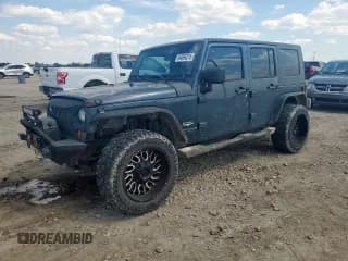 ✅ 2007 Jeep Wrangler Unlimited Sahara • VIN: 1J4GB59137L227672 • Лот: 84594215. Опубликован ранее на Copart с пробегом 234 656 миль. Бесплатный доступ к архиву аукционных продаж из США и подробный отчёт об истории автомобиля на DreamBid. Изображение 1.