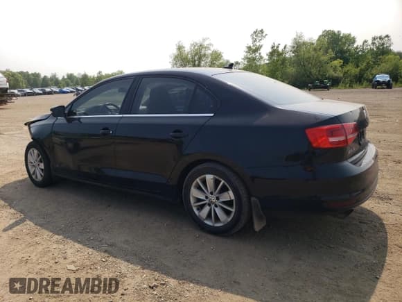 ✅ 2015 Volkswagen Jetta SE • VIN: 3VWD17AJ3FM282085 • Lot: 59718875. Listed on Copart with 87,681 mi. Free auction sales archive from the USA and detailed vehicle history report at DreamBid. Image 2.
