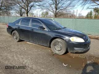 2013 Chevrolet Impala Police with VIN 2G1WD5E33D1263858, listed as a Copart auction lot 49270925 with 132,528 mi miles and Salvage title. Bid and sale history available at DreamBid. Image 4.