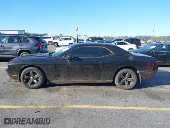 ✅ 2014 Dodge Challenger SXT • VIN: 2C3CDYAG7EH304459 • Lot: 43682366. Listed on IAAI with 197,016 mi. Free auction sales archive from the USA and detailed vehicle history report at DreamBid. Image 14.