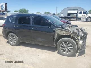 ✅ 2019 Hyundai Santa Fe SEL • VIN: 5NMS3CAD1KH069088 • Лот: 51050573. Опубликован ранее на Copart с пробегом 74 268 миль. Бесплатный доступ к архиву аукционных продаж из США и подробный отчёт об истории автомобиля на DreamBid. Изображение 4.