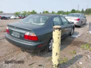 ✅ 1997 Honda Accord EX • VIN: 1HGCE6675VA020916 • Lot: 42397216. Listed on IAAI with 196,494 mi. Free auction sales archive from the USA and detailed vehicle history report at DreamBid. Image 4.