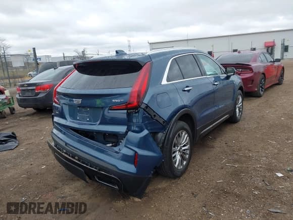 ✅ 2024 Cadillac XT4 AWD Premium Luxury • VIN: 1GYFZDR45RF143981 • Лот: 42032787. Опубликован ранее на IAAI с пробегом 14 700 миль. Бесплатный доступ к архиву аукционных продаж из США и подробный отчёт об истории автомобиля на DreamBid. Изображение 4.