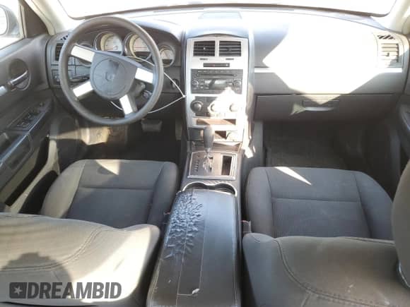 2010 Dodge Charger SXT с VIN 2B3CA3CV9AH242206, выставлен на аукционе Copart как лот 76139314 с пробегом 263 348 миль миль и Списание • Salvage title. История ставок и продаж доступна на DreamBid. Изображение 8.