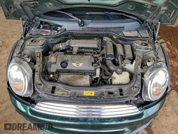 ✅ 2013 MINI Hardtop • VIN: WMWSU3C50DT371067 • Lot: 94555805. Wystawiony na Copart z przebiegiem 131 035 mil. Bezpłatny archiwum sprzedaży aukcyjnych z USA i szczegółowy raport historii pojazdu na DreamBid. Zdjęcie 11.