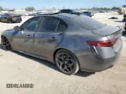 ✅ 2021 Alfa Romeo Giulia • VIN: ZARFAMAN0M7645906 • Lot: 83598394. Listed on Copart with 63,051 mi. Free auction sales archive from the USA and detailed vehicle history report at DreamBid. Image 2.