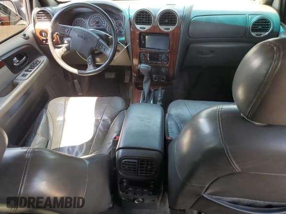 ✅ 2004 GMC Envoy SLE • VIN: 1GKDT13S842134104 • Лот: 68589425. Опубликован ранее на Copart с пробегом 171 126 миль. Бесплатный доступ к архиву аукционных продаж из США и подробный отчёт об истории автомобиля на DreamBid. Изображение 8.