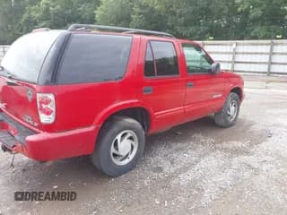✅ 2003 Chevrolet Blazer LS • VIN: 1GNDT13X53K186660 • Lot: 42875160. Wystawiony na IAAI z przebiegiem 232 658 mil. Bezpłatny archiwum sprzedaży aukcyjnych z USA i szczegółowy raport historii pojazdu na DreamBid. Zdjęcie 4.