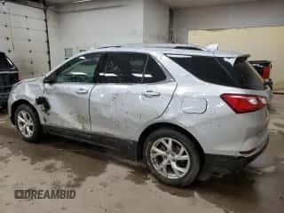 2020 Chevrolet Equinox Premier z VIN 2GNAXNEV6L6160632, wystawiony jako Copart lot #85262685 z przebiegiem 116 837 mil mil oraz Szkoda całkowita • Salvage title. Historia ofert i sprzedaży dostępna na DreamBid. Obrazek 2.
