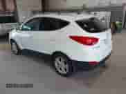 2013 Hyundai Tucson Limited with VIN KM8JUCAC7DU693839, listed as a IAAI auction lot 43026808 with 205,556 mi miles and . Bid and sale history available at DreamBid. Image 3.