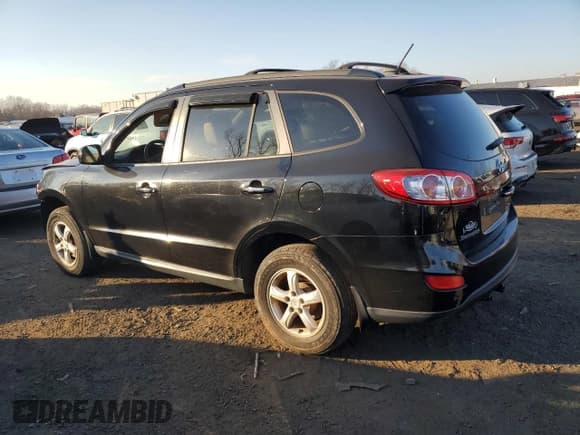 ✅ 2012 Hyundai Santa Fe Limited • VIN: 5XYZKDAG0CG104233 • Лот: 81154684. Опубликован ранее на Copart с пробегом 131 394 миль. Бесплатный доступ к архиву аукционных продаж из США и подробный отчёт об истории автомобиля на DreamBid. Изображение 2.
