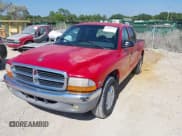 ✅ 2000 Dodge Dakota Sport • VIN: 1B7GL2AX0YS685498 • Lot: 42069753. Listed on IAAI with 56,269 mi. Free auction sales archive from the USA and detailed vehicle history report at DreamBid. Image 2.