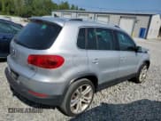 ✅ 2013 Volkswagen Tiguan SE • VIN: WVGBV7AX0DW520423 • Lot: 68394895. Listed on Copart with 128,141 mi. Free auction sales archive from the USA and detailed vehicle history report at DreamBid. Image 3.