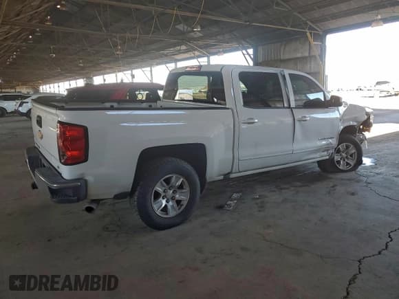 ✅ 2018 Chevrolet Silverado 1500 LT • VIN: 3GCPCREC5JG520186 • Lot: 93995705. Wystawiony na Copart z przebiegiem 123 439 mil. Bezpłatny archiwum sprzedaży aukcyjnych z USA i szczegółowy raport historii pojazdu na DreamBid. Zdjęcie 3.