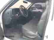 2002 Chevrolet Silverado 1500 LS with VIN 1GCEK14T32Z255752, listed as a IAAI auction lot 42347450 with 145,616 mi miles and . Bid and sale history available at DreamBid. Image 5.