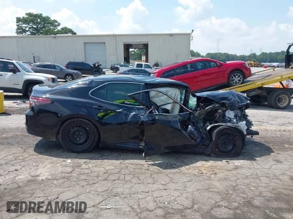 2022 Toyota Camry Hybrid LE с VIN 4T1C31AK2NU575304, выставлен на аукционе IAAI как лот 43017963 с пробегом 165 647 миль миль и . История ставок и продаж доступна на DreamBid. Изображение 13.