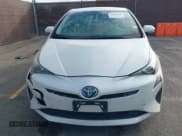 ✅ 2018 Toyota Prius Two • VIN: JTDKBRFU3J3590860 • Lot: 43486808. Listed on IAAI with 92,820 mi. Free auction sales archive from the USA and detailed vehicle history report at DreamBid. Image 12.