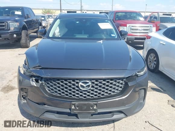 ✅ 2023 Mazda CX-50 S Preferred Plus • VIN: 7MMVABCM0PN106619 • Lot: 43193144. Listed on IAAI with 71,077 mi. Free auction sales archive from the USA and detailed vehicle history report at DreamBid. Image 12.