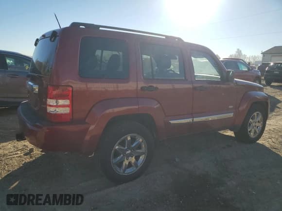 ✅ 2012 Jeep Liberty Sport • VIN: 1C4PJMAK1CW212779 • Лот: 90847015. Опубликован ранее на Copart с пробегом 179 393 миль. Бесплатный доступ к архиву аукционных продаж из США и подробный отчёт об истории автомобиля на DreamBid. Изображение 3.