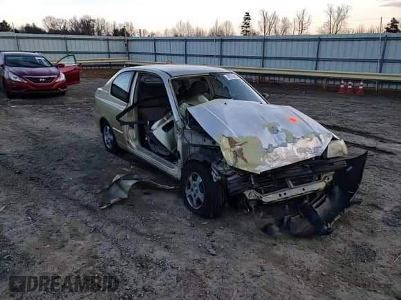 2001 Hyundai Accent GS z VIN KMHCG35C81U152921, wystawiony jako Copart lot #42519995 z przebiegiem 154 669 mil mil oraz Szkoda całkowita • Salvage title. Historia ofert i sprzedaży dostępna na DreamBid. Obrazek 10.