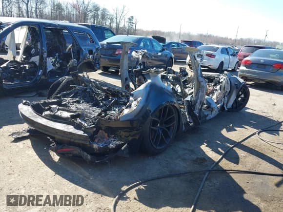✅ 2021 Tesla Model S Plaid • VIN: 5YJSA1E68MF455324 • Lot: 41876749. Listed on IAAI with Not provided. Free auction sales archive from the USA and detailed vehicle history report at DreamBid. Image 4.