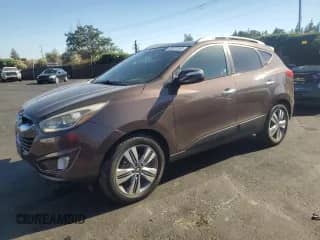 2014 Hyundai Tucson SE z VIN KM8JU3AG0EU795228, wystawiony jako Copart lot #69202565 z przebiegiem 138 146 mil mil oraz Czysty tytuł • Clean title. Historia ofert i sprzedaży dostępna na DreamBid. Obrazek 1.