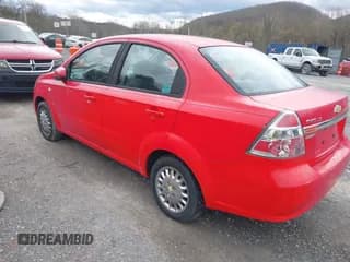 ✅ 2007 Chevrolet Aveo LS • VIN: KL1TD56697B165593 • Lot: 41910371. Wystawiony na IAAI z przebiegiem 104 849 mil. Bezpłatny archiwum sprzedaży aukcyjnych z USA i szczegółowy raport historii pojazdu na DreamBid. Zdjęcie 3.