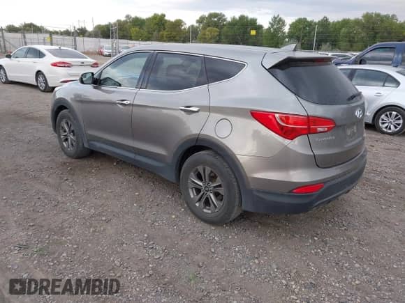 2015 Hyundai Santa Fe with VIN 5XYZTDLB3FG250726, listed as a IAAI auction lot 43108562 with 178,355 mi miles and . Bid and sale history available at DreamBid. Image 3.