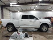 ✅ 2018 Ram 2500 SLT • VIN: 3C6TR5DTXJG284102 • Lot: 41609869. Listed on IAAI with 148,869 mi. Free auction sales archive from the USA and detailed vehicle history report at DreamBid. Image 14.