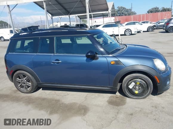 ✅ 2011 MINI Clubman • VIN: WMWZF3C51BT187763 • Lot: 42883484. Listed on IAAI with 118,389 mi. Free auction sales archive from the USA and detailed vehicle history report at DreamBid. Image 14.