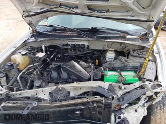 2005 Mercury Mariner Luxury z VIN 4M2YU56185DJ17484, wystawiony jako IAAI lot #42364348 z przebiegiem 199 262 mil mil oraz . Historia ofert i sprzedaży dostępna na DreamBid. Obrazek 10.