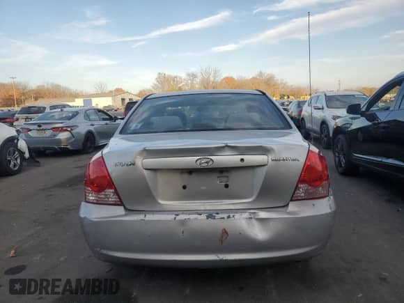 2005 Hyundai Elantra GLS with VIN KMHDN46D65U024593, listed as a Copart auction lot 78614304 with 107,691 mi miles and Salvage title. Bid and sale history available at DreamBid. Image 6.