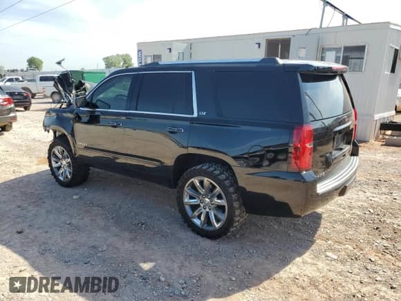 2015 Chevrolet Tahoe LTZ with VIN 1GNSKCKC6FR170659, listed as a Copart auction lot 69412835 with 252,198 mi miles and Salvage title. Bid and sale history available at DreamBid. Image 2.
